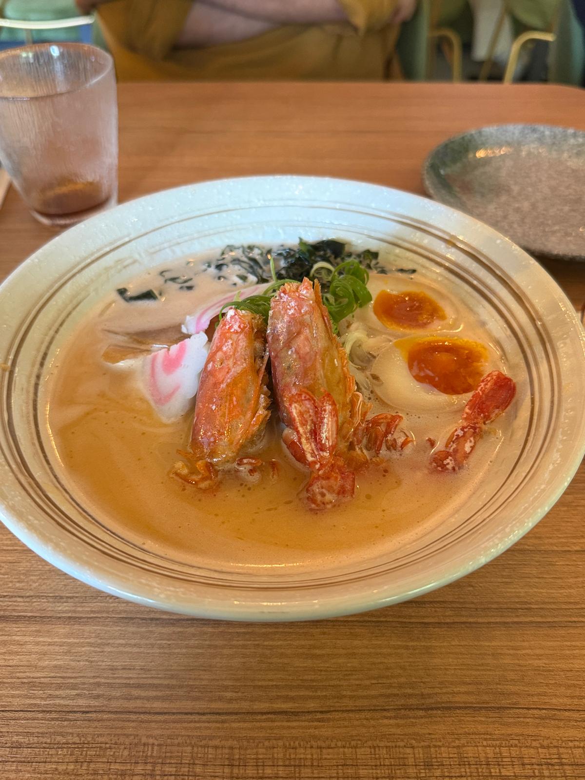 A creamy shrimp ramen eaten somewhere in Japan